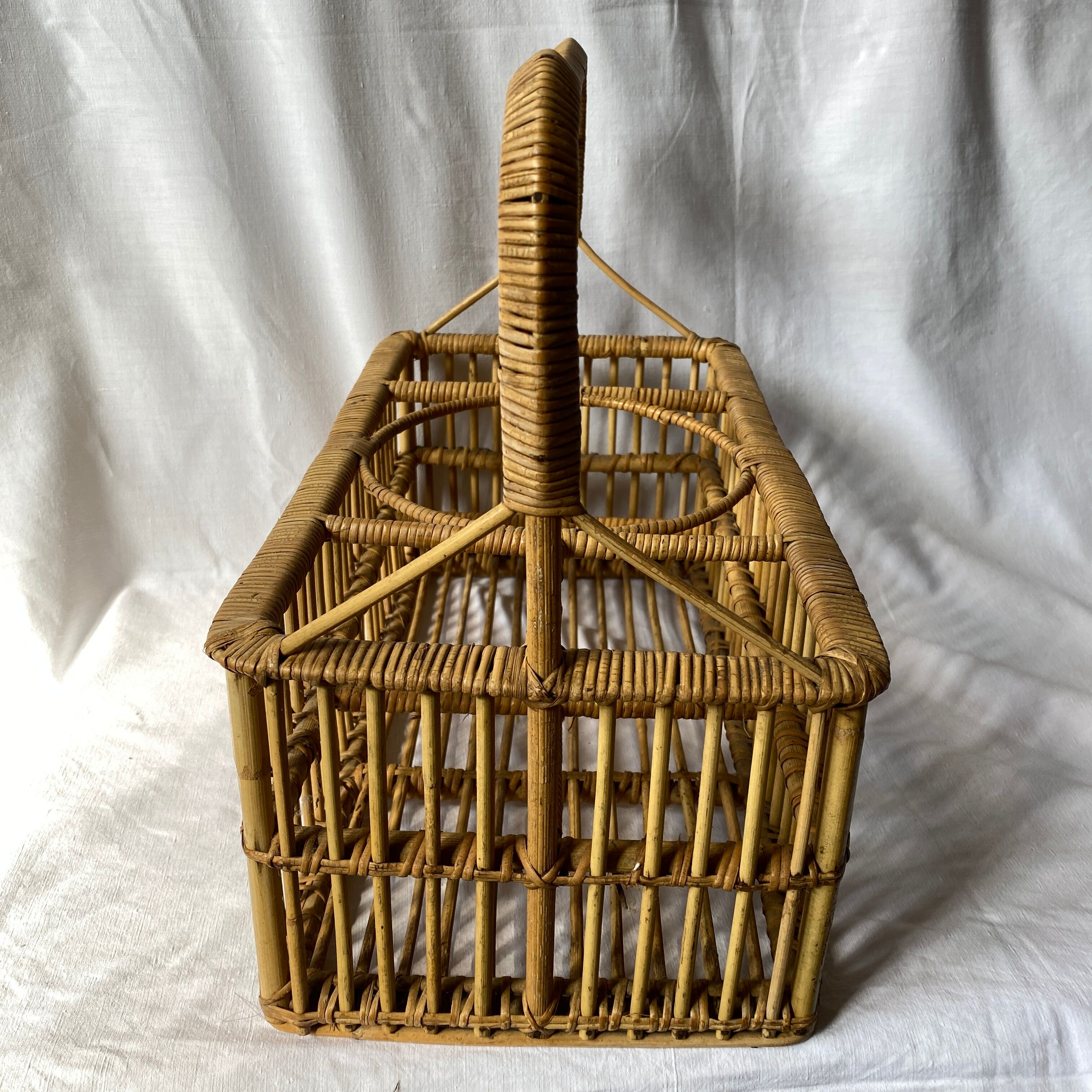 Vintage rattan bottle rack basket