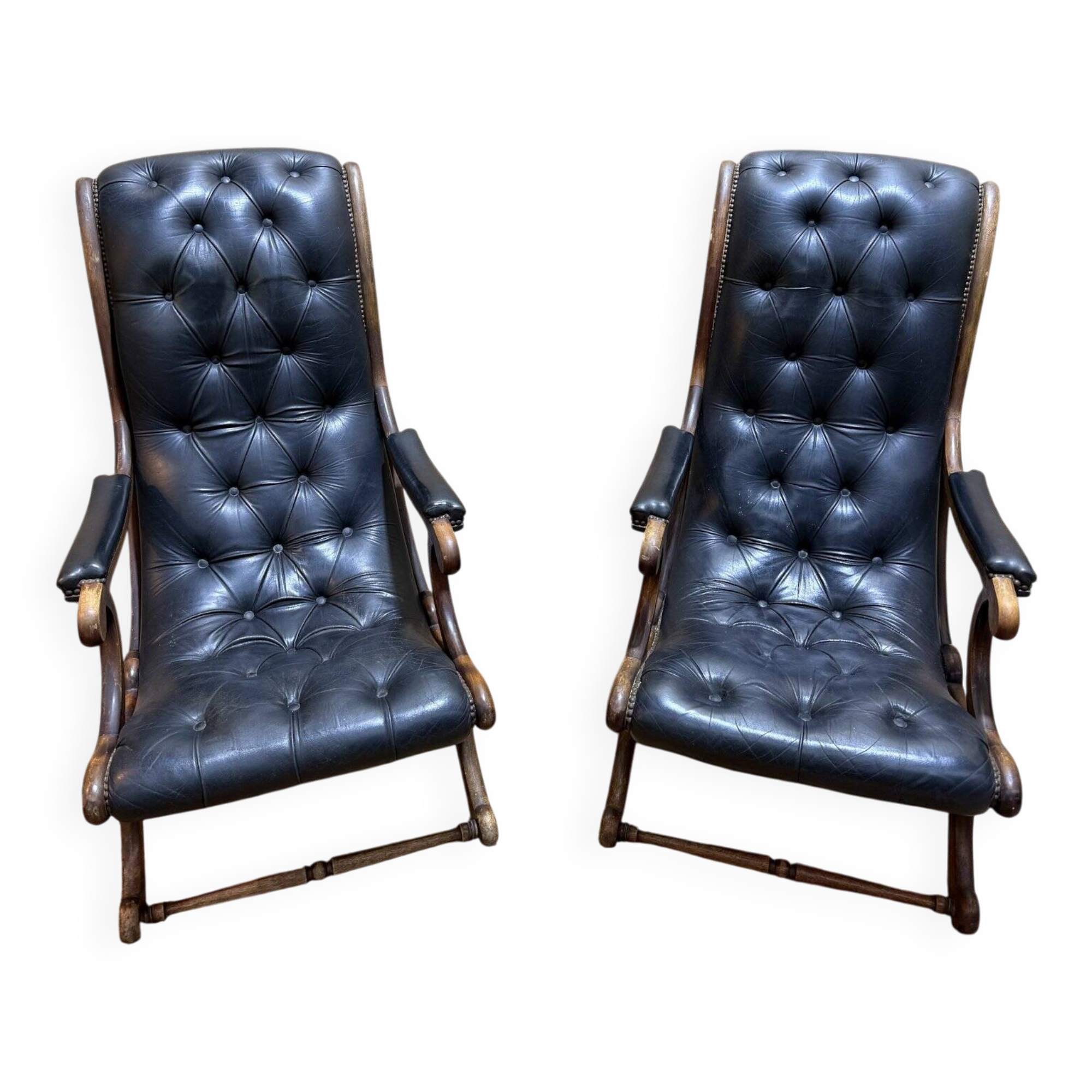 Pair of English Chesterfield armchairs in black leather