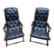 Paire de fauteuils anglais chesteefield en cuir noir