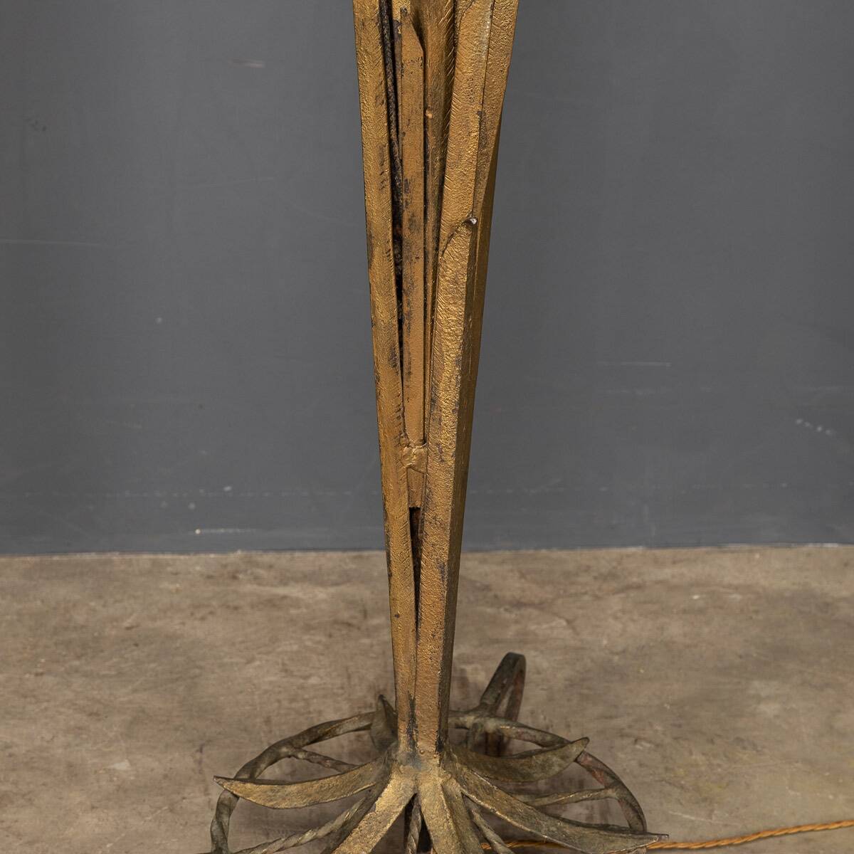 A french gilt wrought iron floor lamp, attributed to maison bagues c.1970