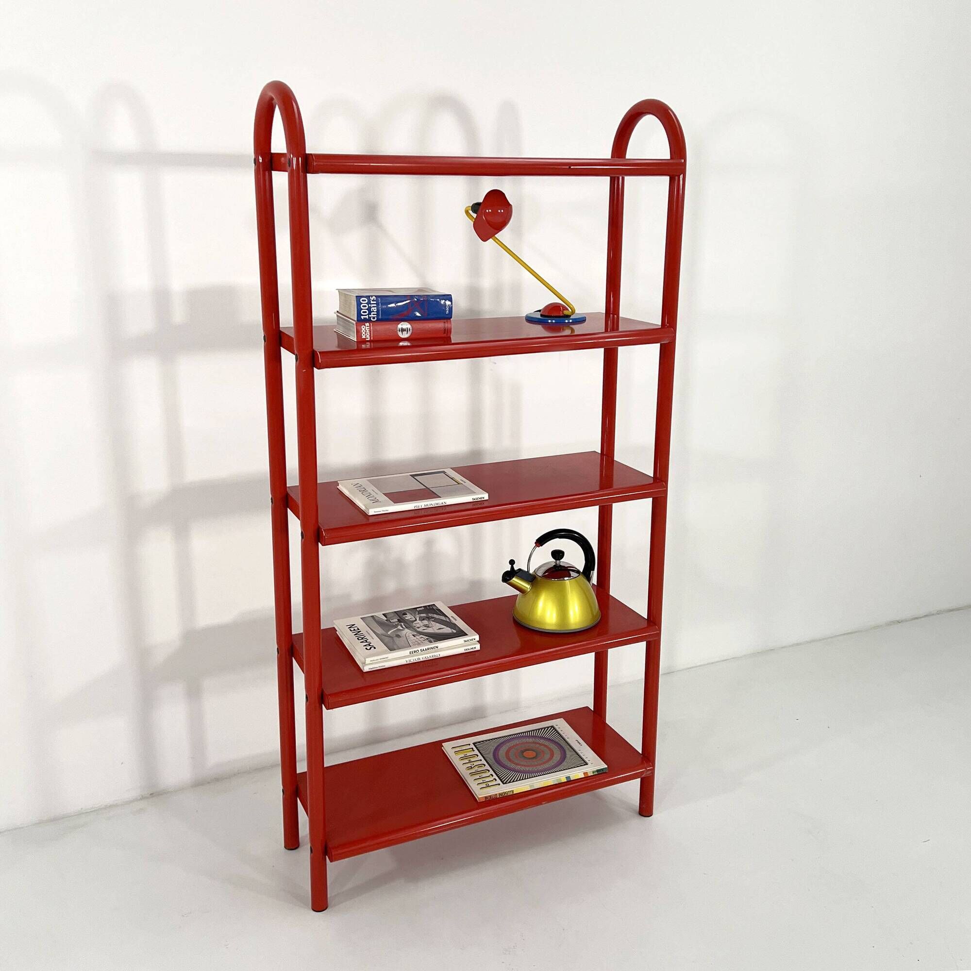 Red tubular leg shelf, 1980