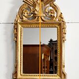 Miroir en bois doré, style Louis XVI – 1ère partie XXe - 60x30cm