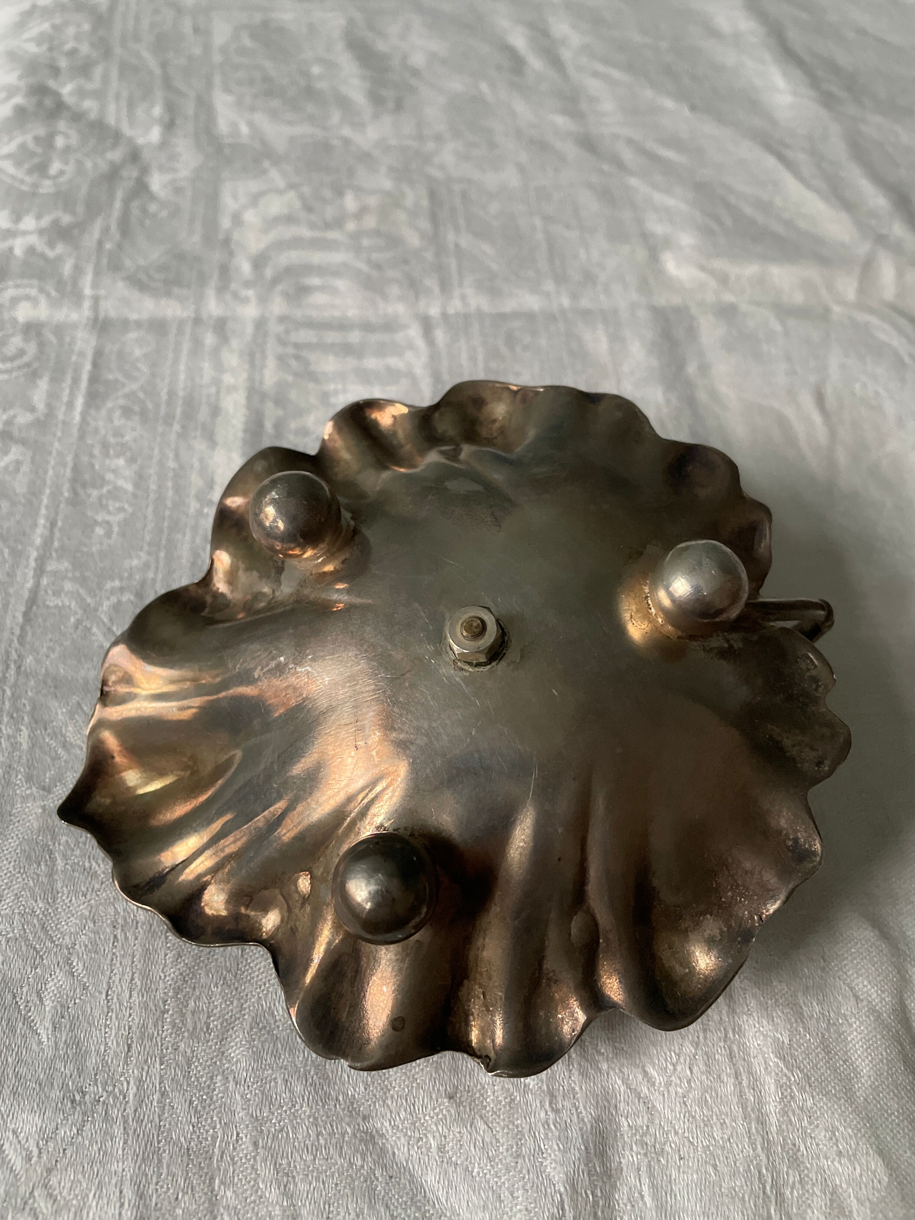 Old leaf-shaped hand candle holder, mid-twentieth