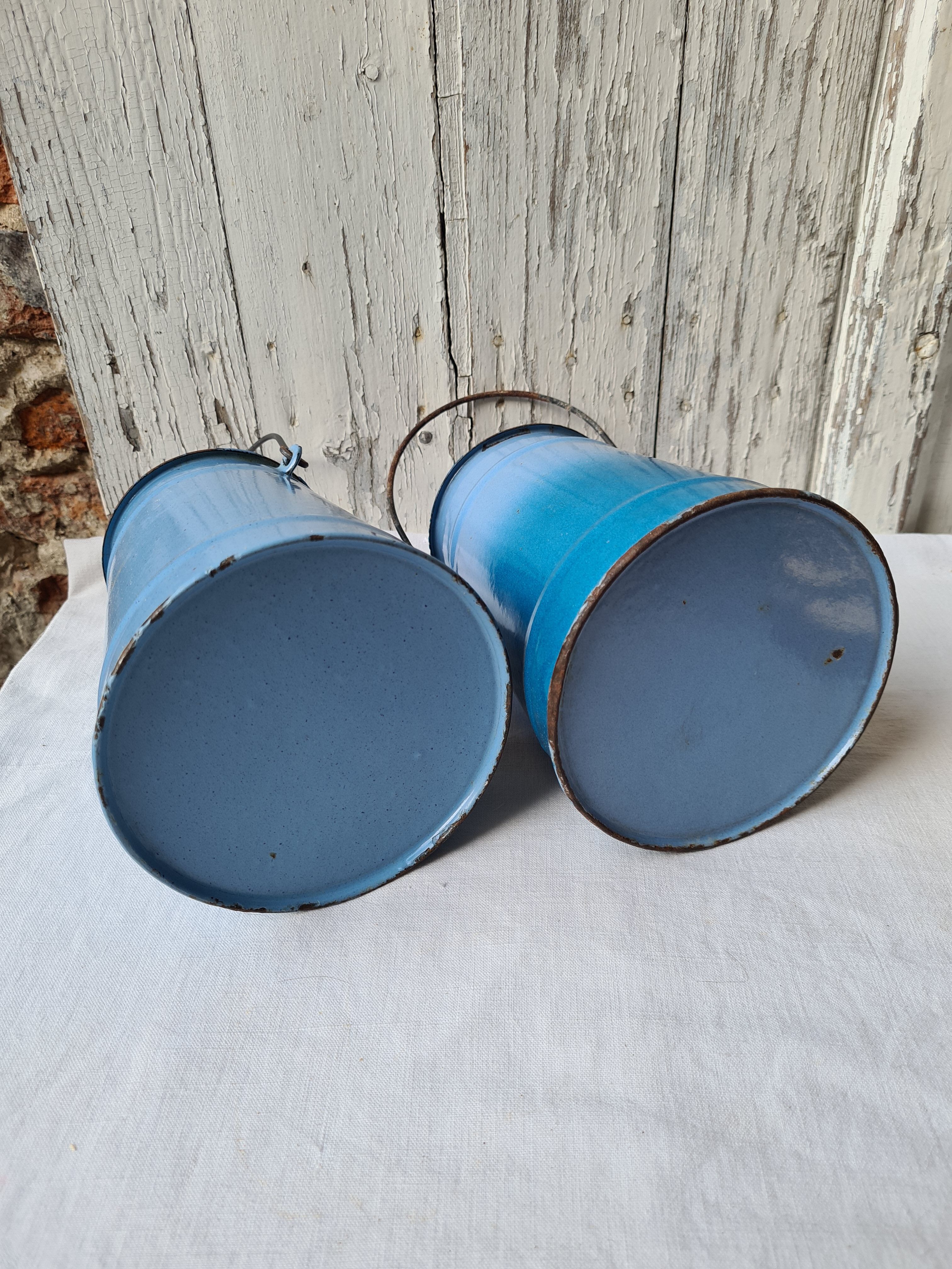 Two enamelled milk jars
