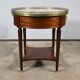 Table bouillotte en acajou, style Louis XVI, fin XIXème
