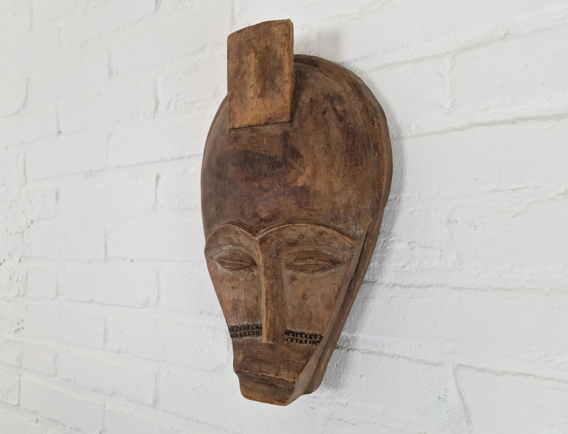 20th century carved African tribal mask