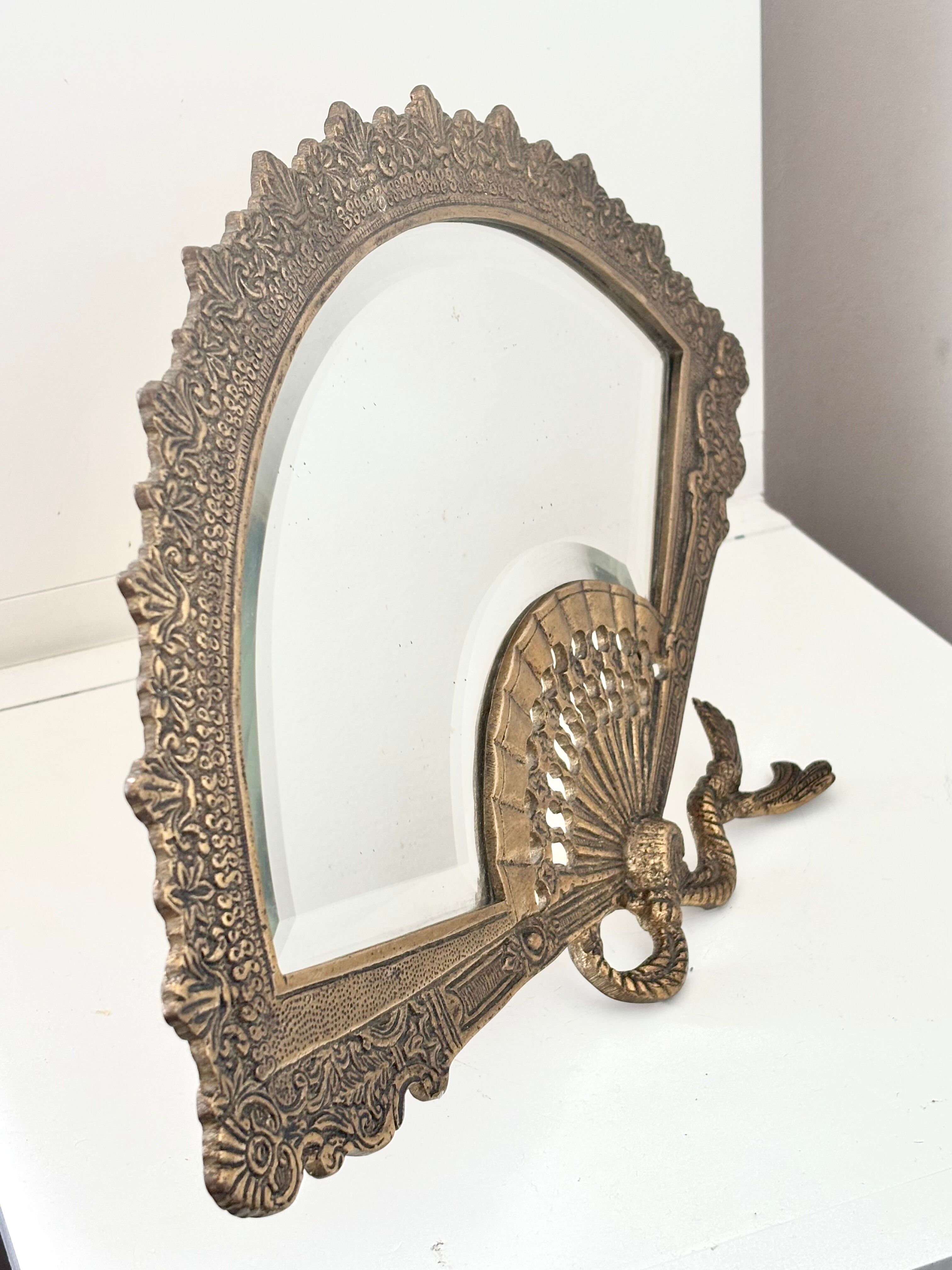 Antique brass mirror