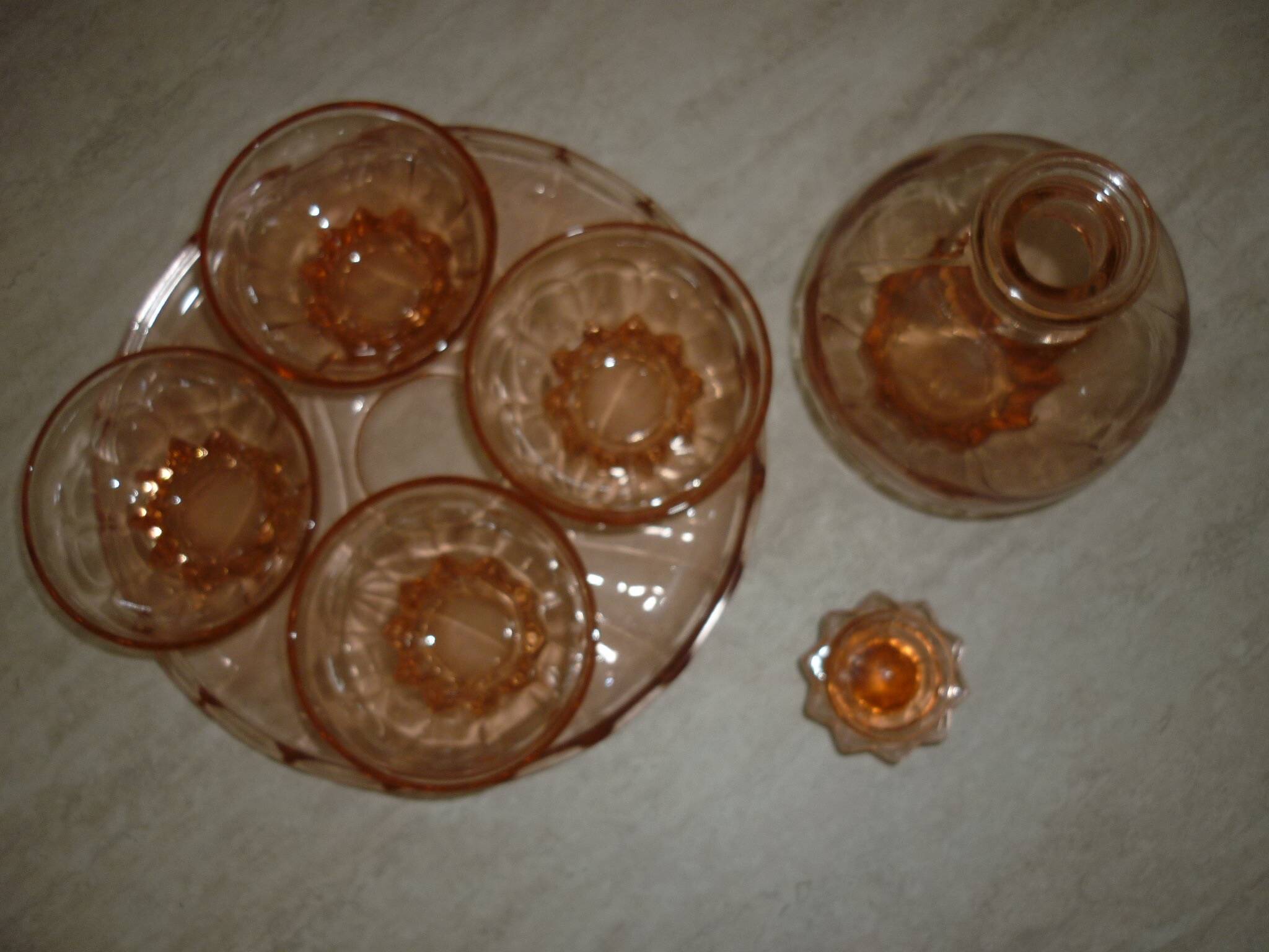 Art deco liqueur service in pink transparent glass with stopper