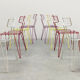 Vintage multicolor stackable wire chairs