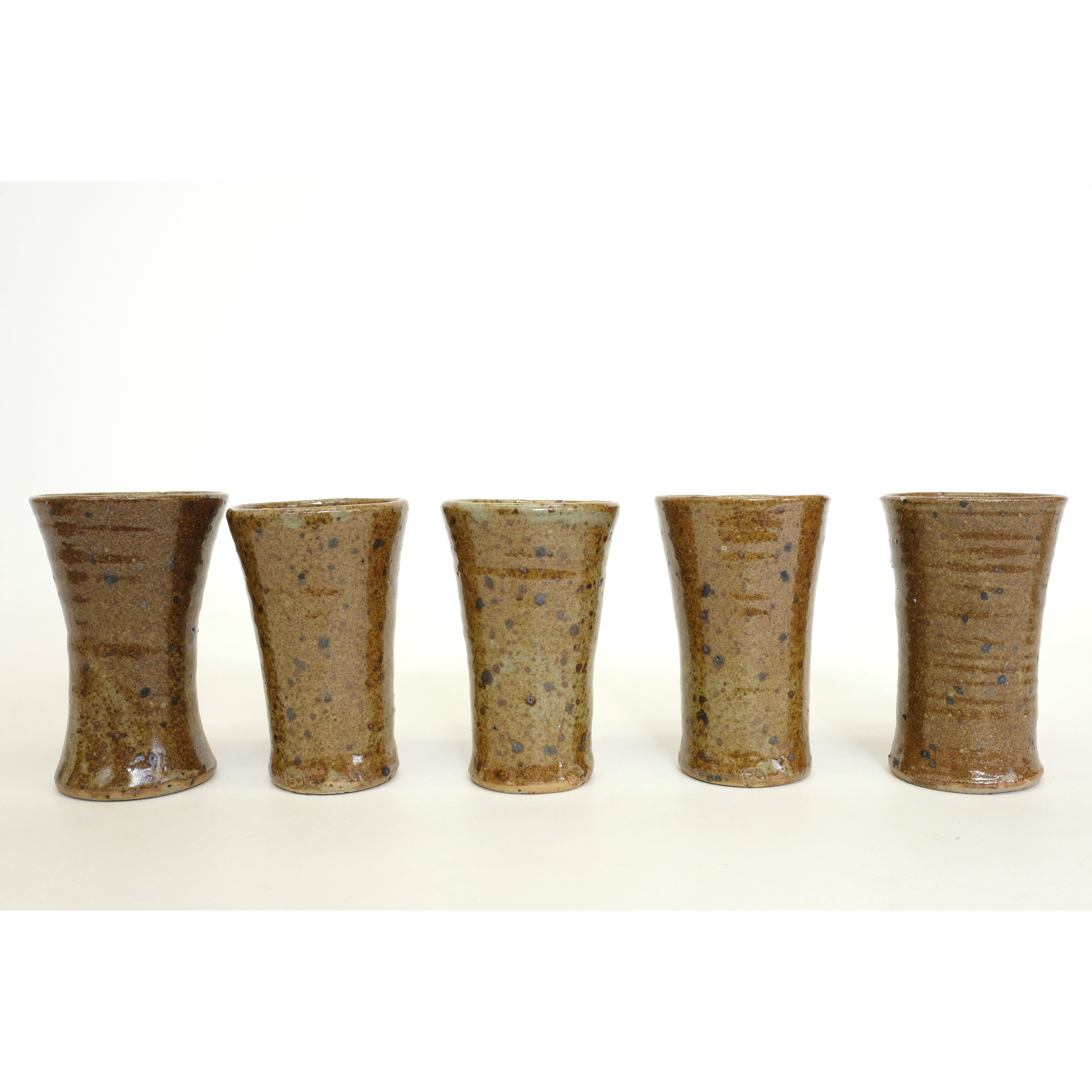 Sandstone teapot from La Borne and 5 cups signed Tiffoche, 1970s.