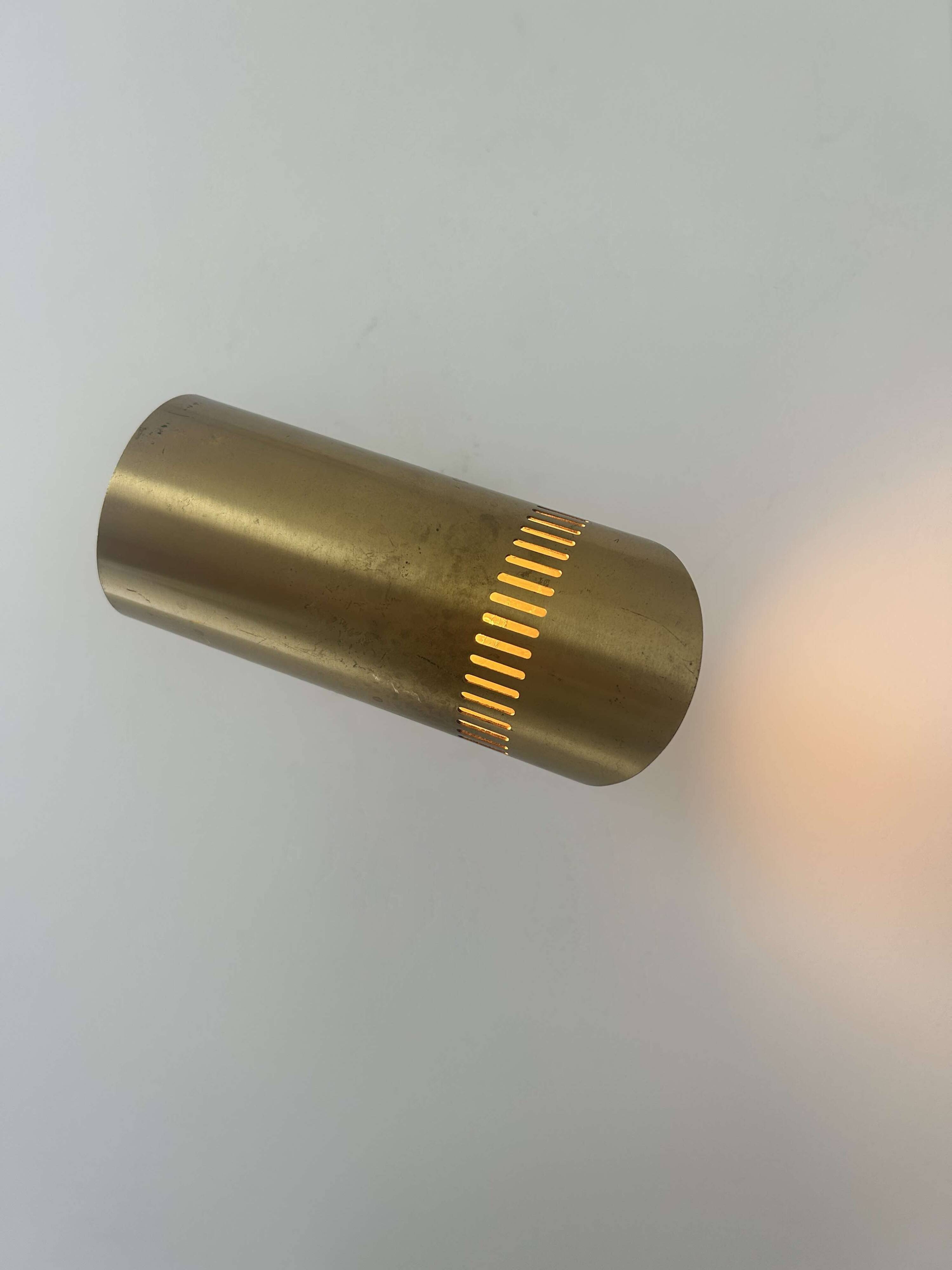 Vintage adjustable wall light, solid perforated brass, France 1960