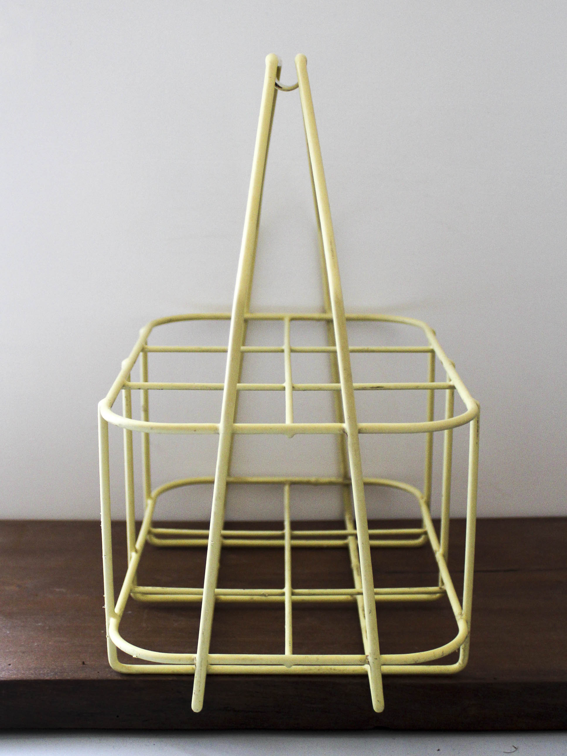 Yellow metal bottle holder