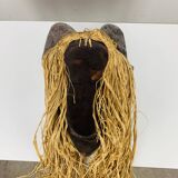 African ceramic and raffia mask signed BJ