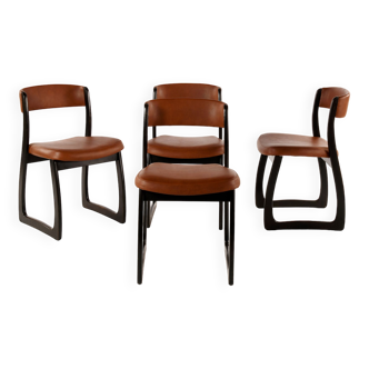 Lot de 4 chaises vintage traineau bois et skaï