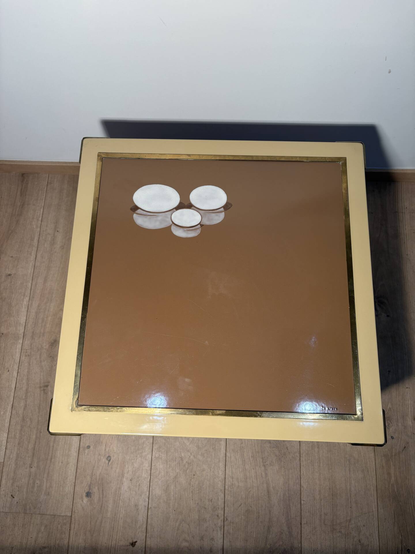 Metal and brass coffee table in ceramic by Nisco.