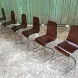 Chairs in plexiglas with chrome metal base