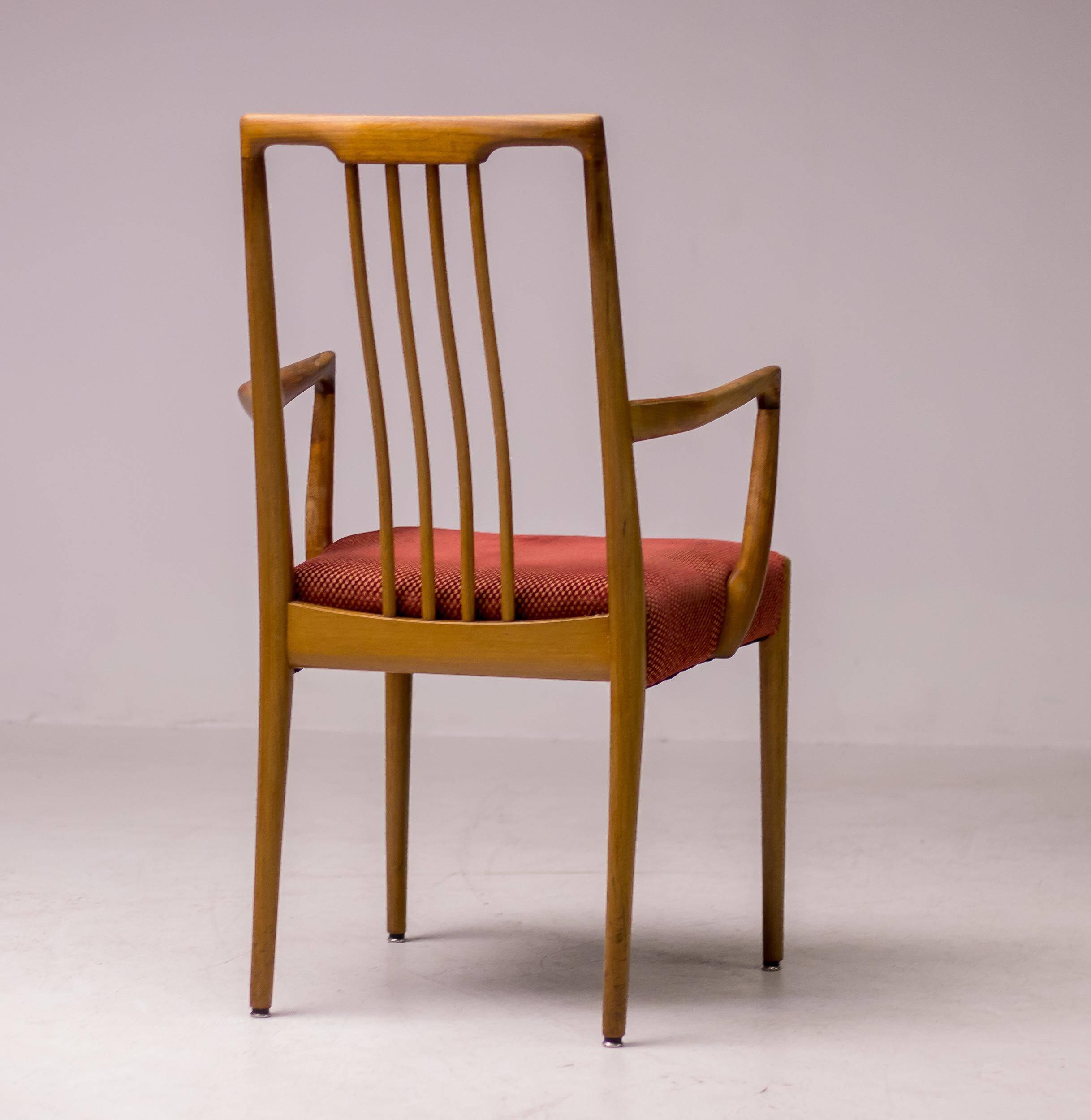 Set of six carved walnut dining chairs, Italy, 1955