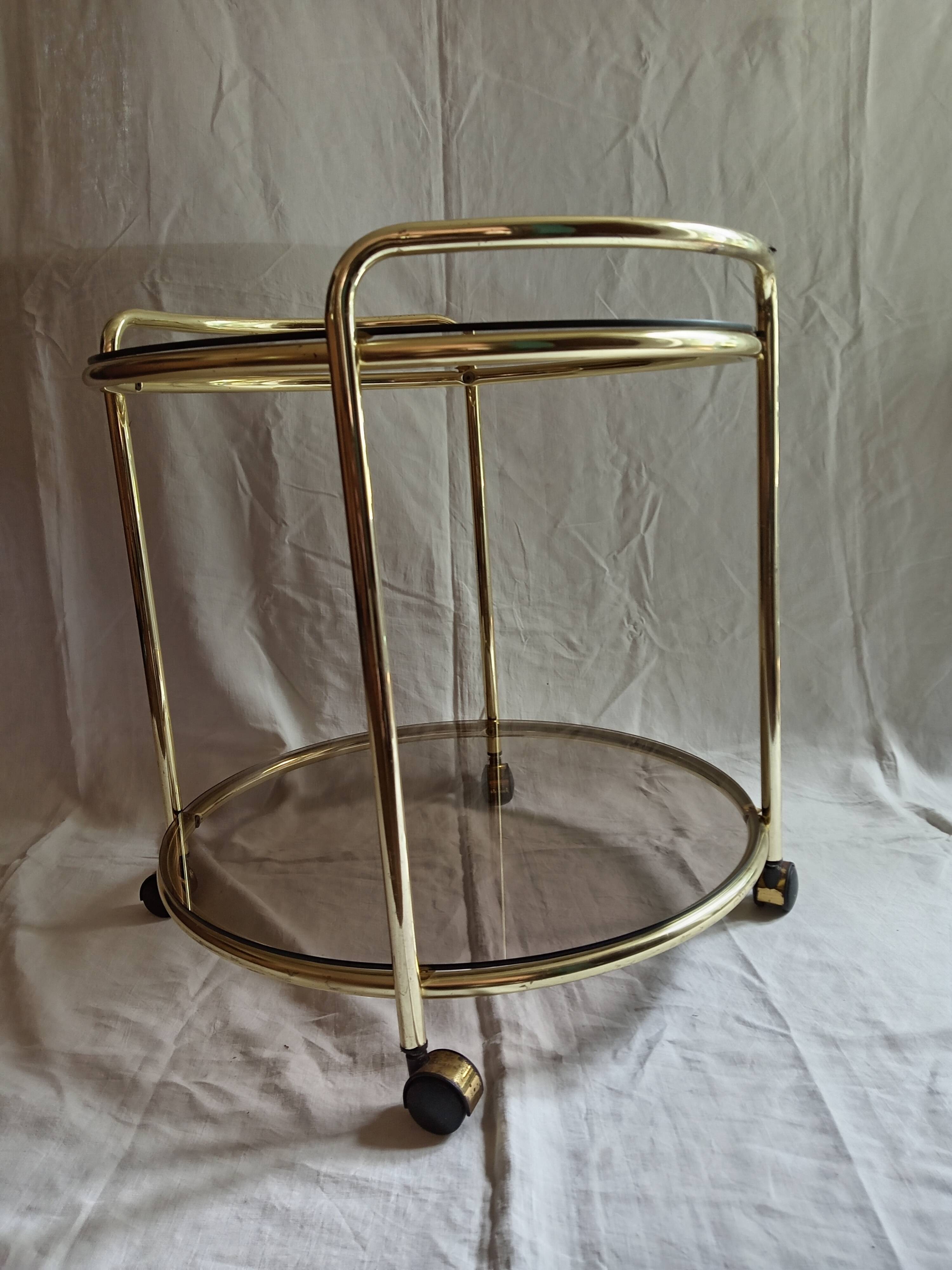 Vintage serving trolley with smoked glass from the 1970s