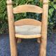 Chaise basse bois et paille années 50