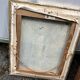 Antique painting – Medieval village scene by the water, signed