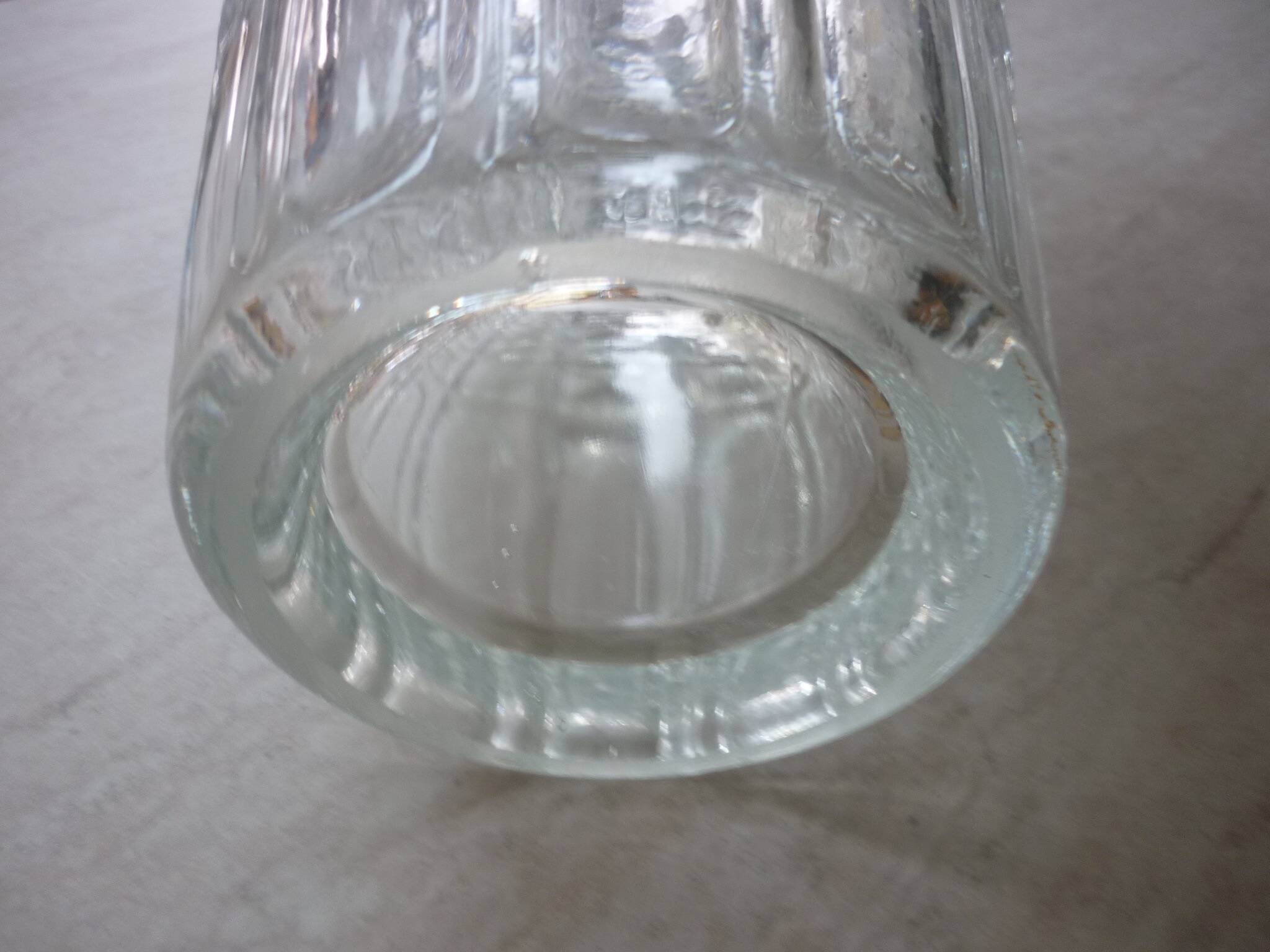 Transparent glass vase with art deco geometric patterns
