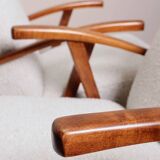 Vintage armchair in pearl white bouclé with walnut wood, 1960.