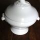 Antique soup tureen, white earthenware, with stopper decoration.