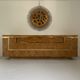 Sideboard in elm magnifying glass and brass. 1970