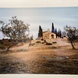 Laminated photograph.