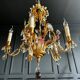 Lustrous pagoda from Maison Baguès in gilded bronze with a decoration of flowers and fruits in glass - 20th century