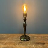 Black table lamp with paint splatters from the 1920s