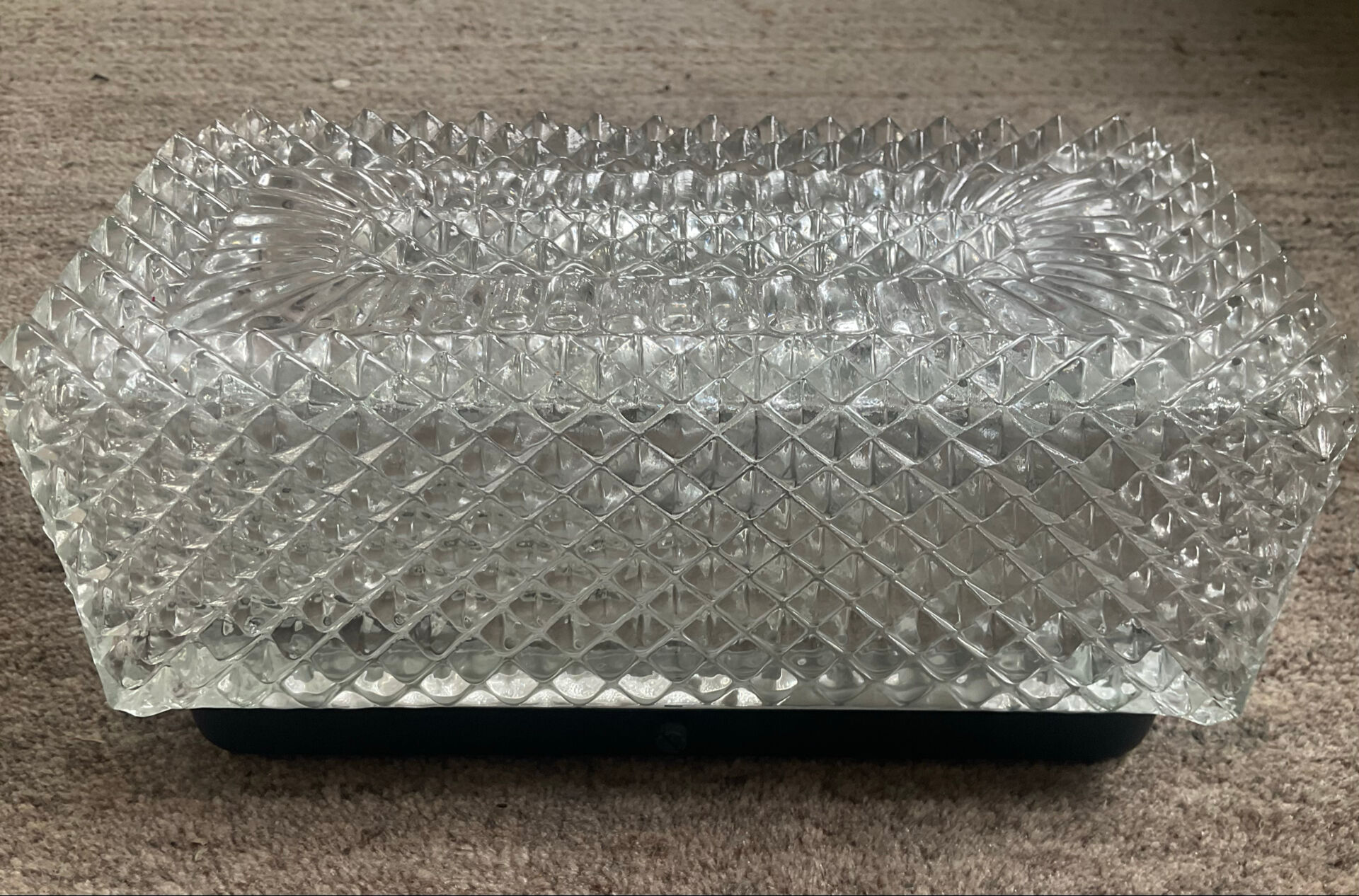 Vintage glass wall light from the 1970s.
