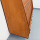 Vintage wooden display bookshelf with drawers from the 1960s.