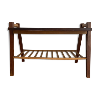 Table basse aux pieds compas
