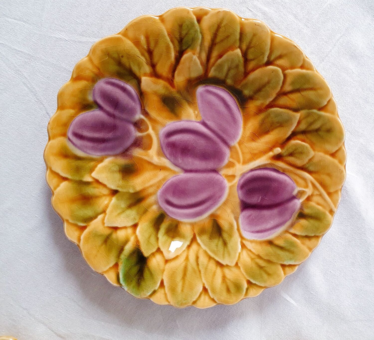 Five dessert plates in Sarreguemines slip