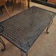 Table basse metal perforé pied fer forgé 1940