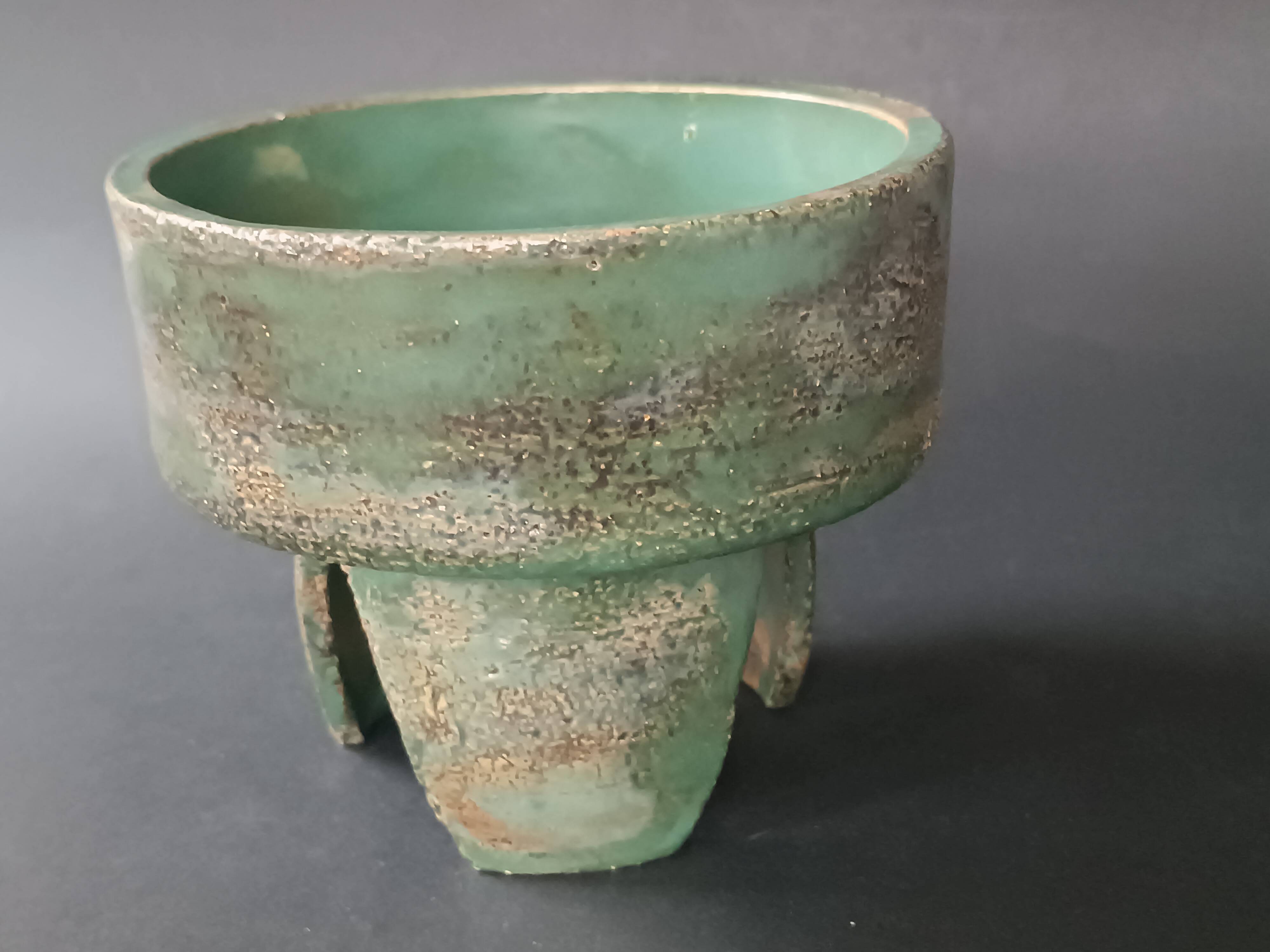 Footed dish in chamotte stoneware green with signature 1960