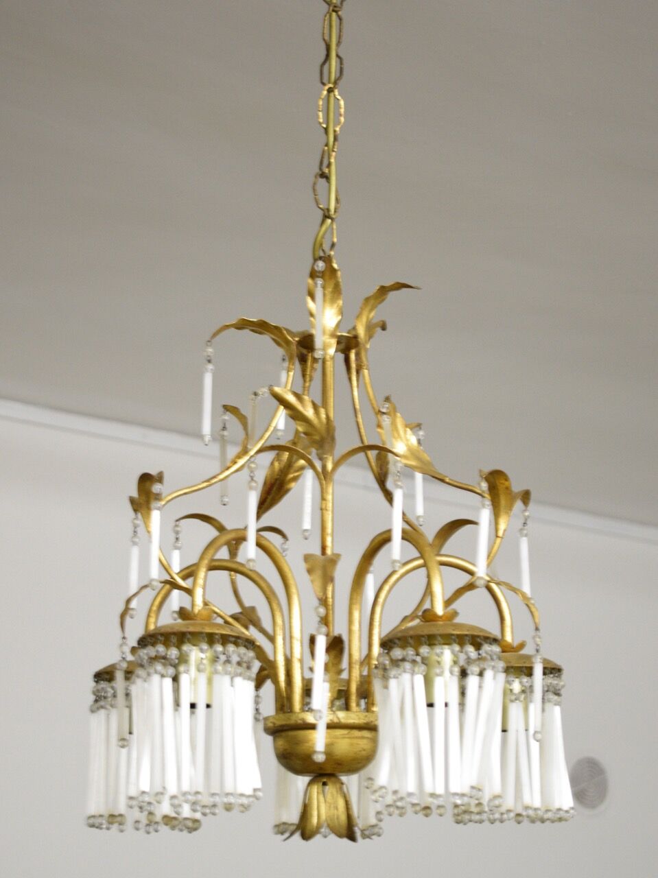 Golden metal chandelier in crystal pendants