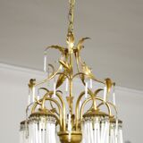 Lustre en métal doré en pendeloques en cristal