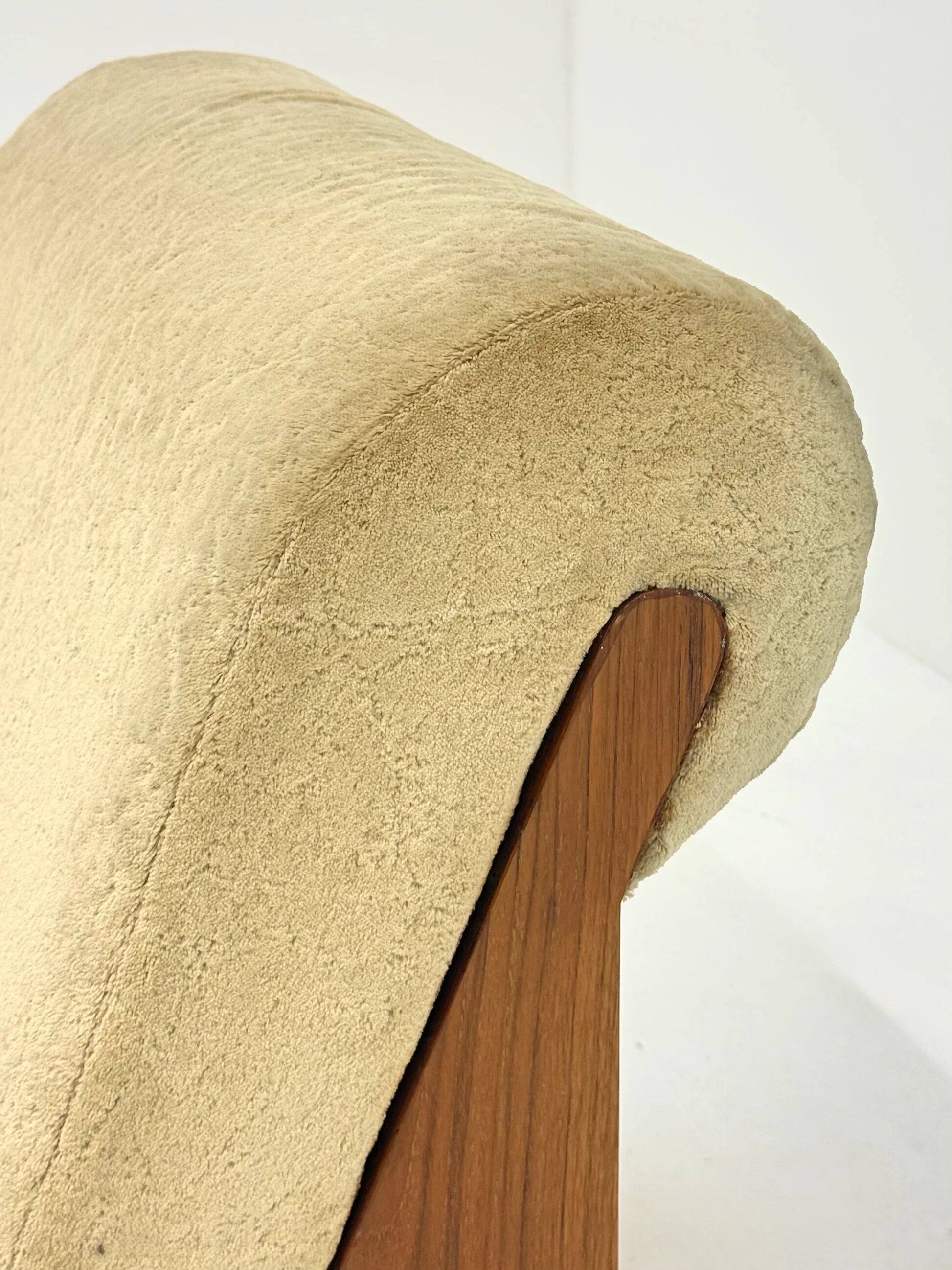 Vintage mid-century beige armchair with wooden frame and ottoman