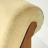 Vintage mid-century beige armchair with wooden frame and ottoman