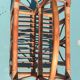 Vintage rattan magazine rack – Natural and retro elegance