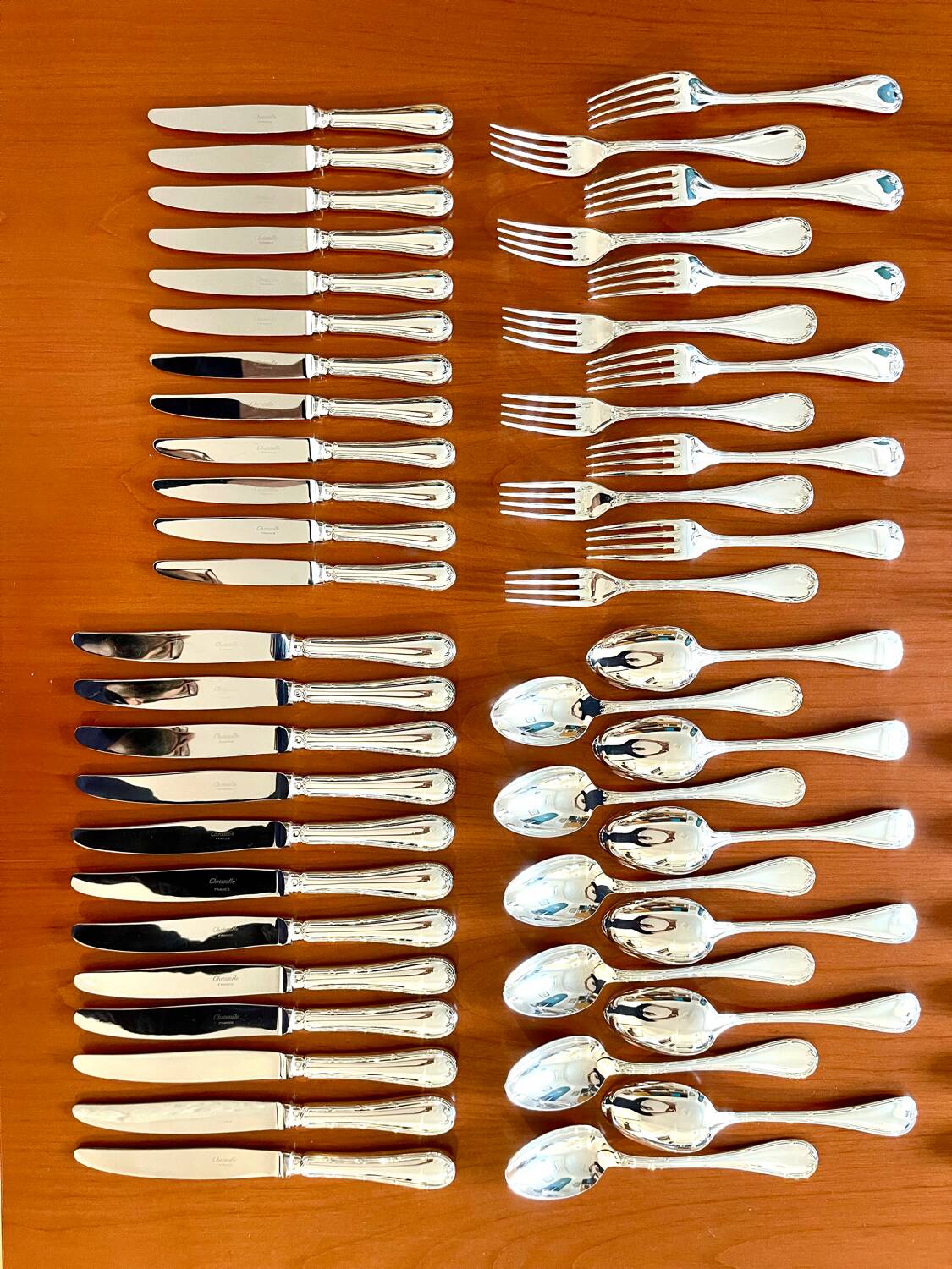 Christofle crossed ribbons, 73-piece cutlery set in new condition.