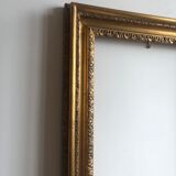 Wooden frame and gilded stucco