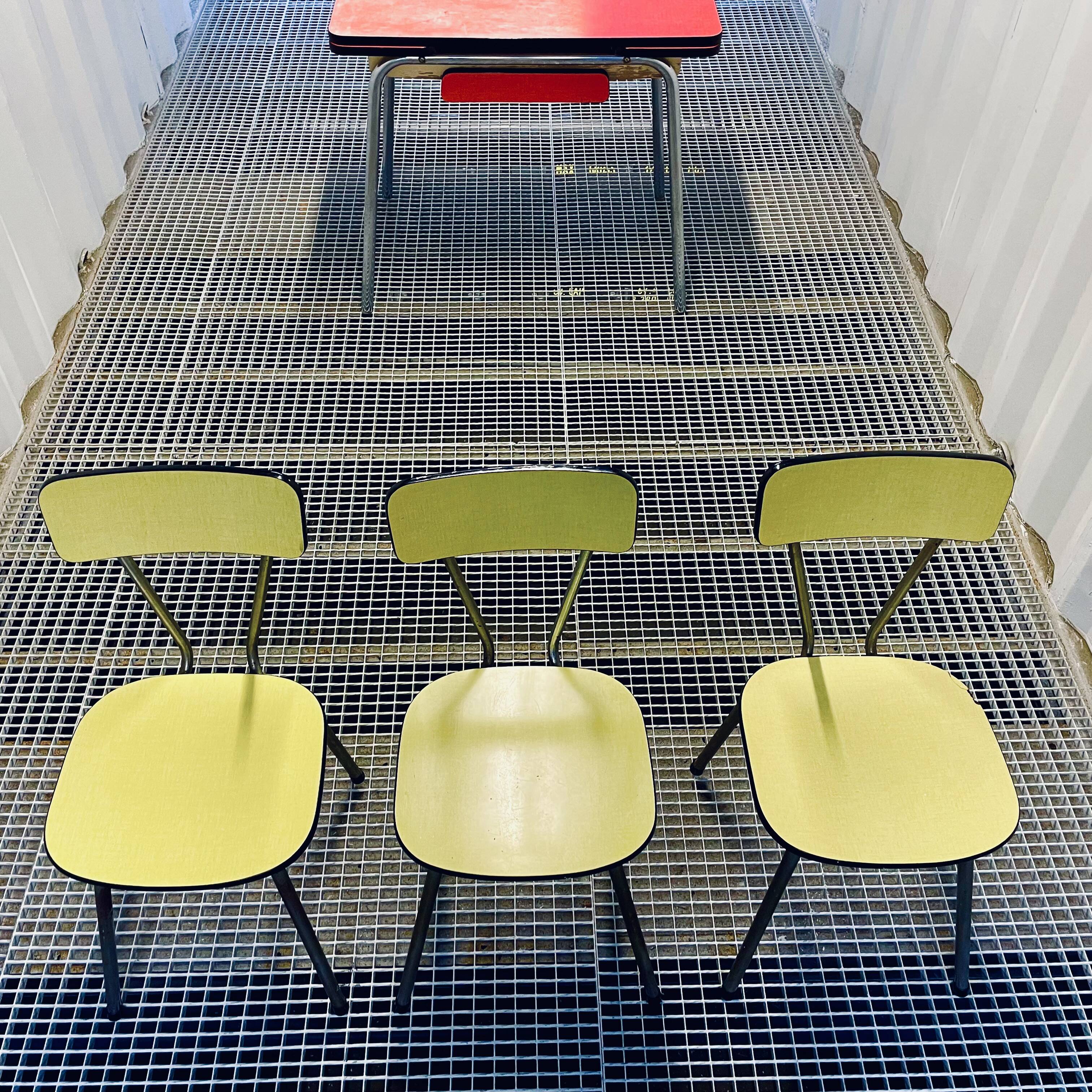 Red Formica table and vintage yellow chairs
