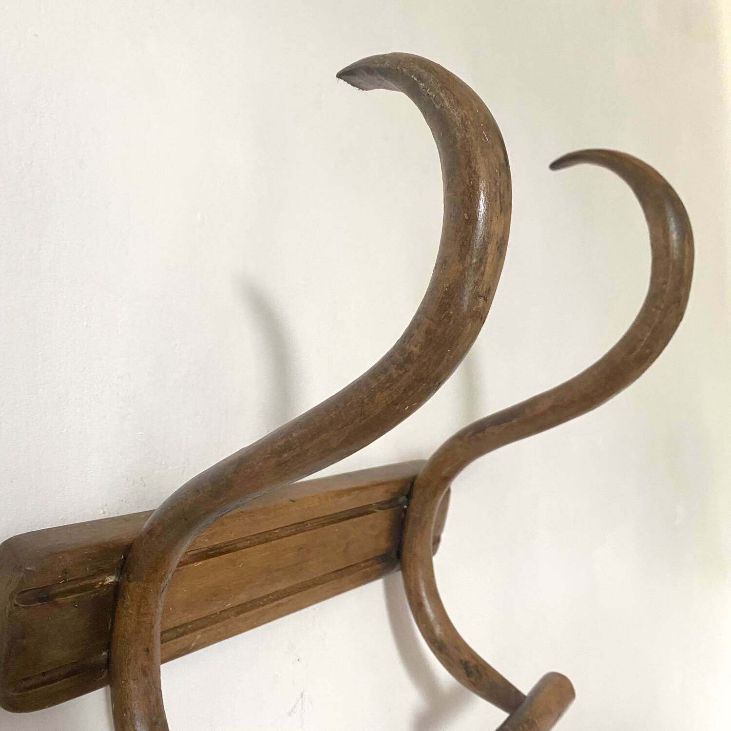 Curved wooden coat rack from the early 20th century