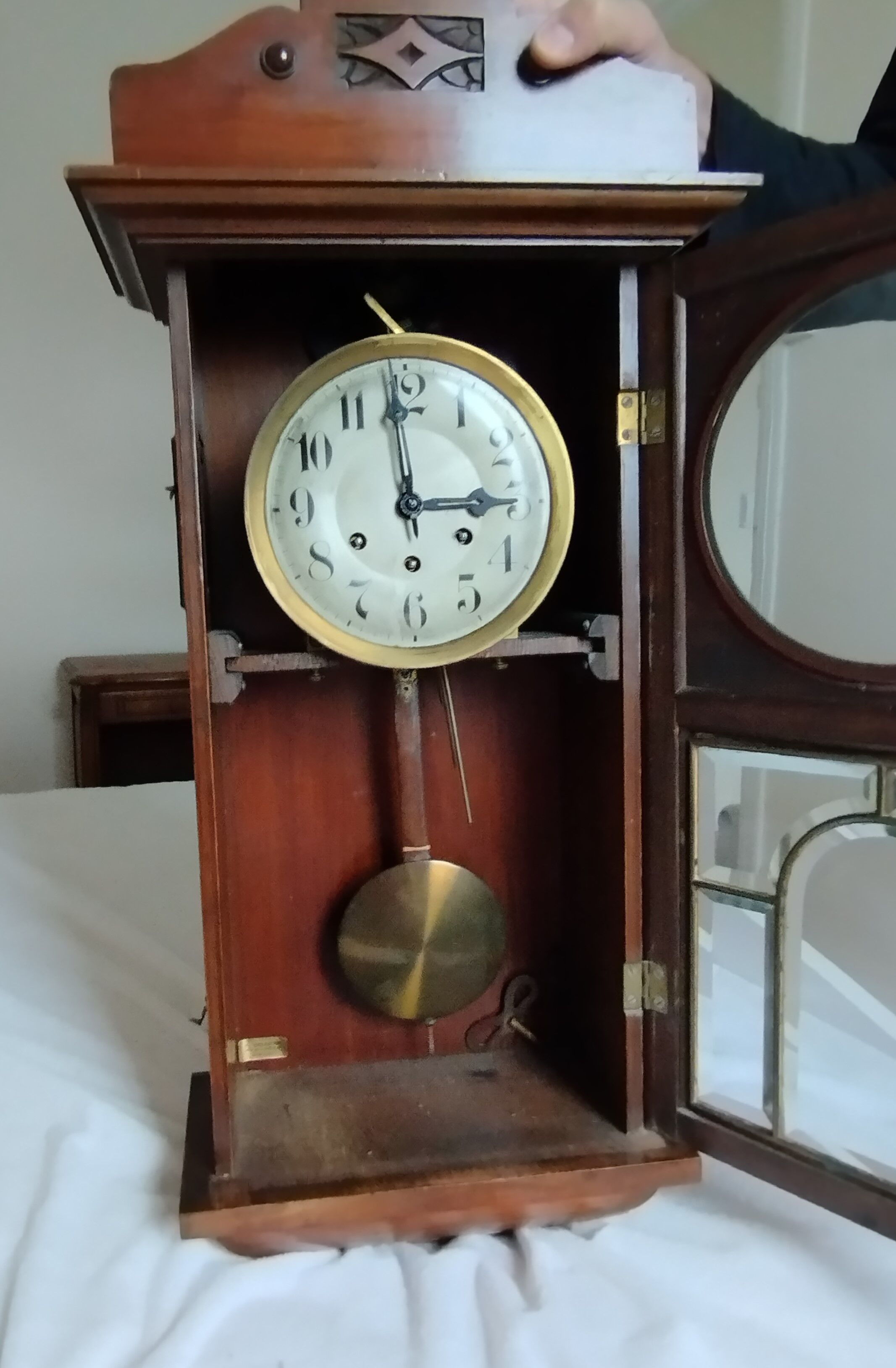 Wooden clock with beveled glass