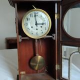Wooden clock with beveled glass