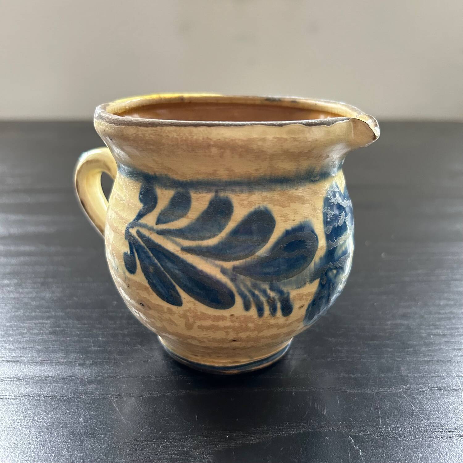 Pitcher with blue floral decor