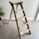 Former stepladder of patinated wood painter